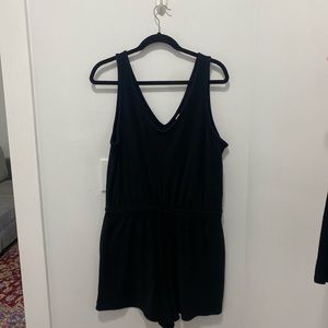 Black romper size large. Great pool side summer classic piece. retails for $25.